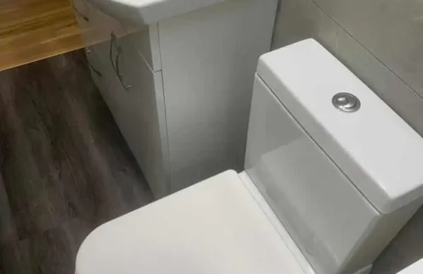 Toilet, wash basin, and Vanity unit.