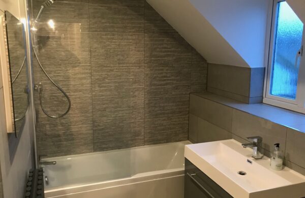 Designer bathroom in Caldecote