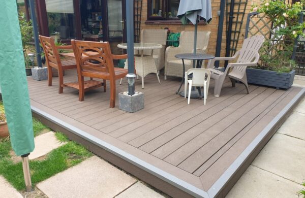 NeoTimber chocolate decking with grey trim in Cambridge