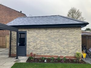 Completed garage within the curtilage of a listed building 