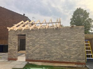 first roof trusses in place 