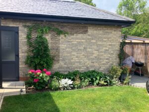 Side door in place and perspex roof over storage area